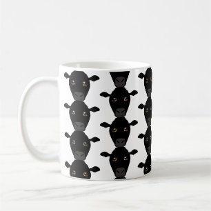 De Café Vacas negras na caneca
