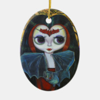 Boneca bonito do vampiro com ornamento do bastão