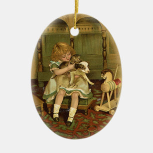 De Cerâmica Criança bonita que guardara um ornamento do