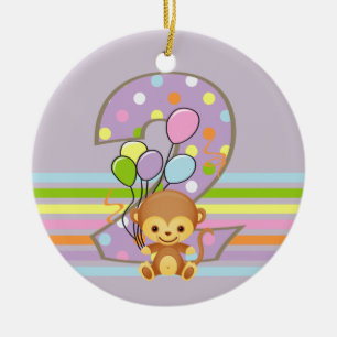 De Cerâmica Macaco do segundo aniversário e ornamento roxos