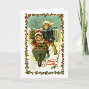 De Festividades Crianças do cartão do natal vintage na neve