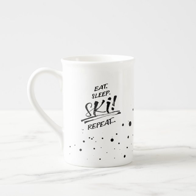 De Porcelana Caneca temática - Coma Durma Esqui Repita (Esquerda)