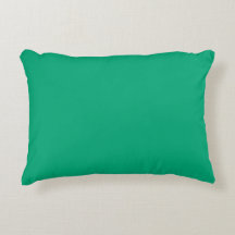 almofada retangular verde-teal com bordas suavemen
