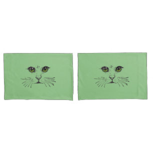 Desenho a preto de um rosto de gato olhos verdes b