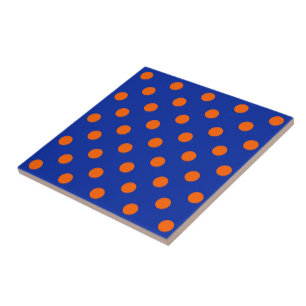 Design de padrão de bolinhas laranja sobre azul