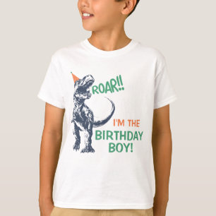 Dinossauro T-Rex na camisa do menino do