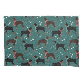 Dobermanes vermelhos e negros em Escarpões Padrão