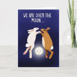 dois coelhos sobre a lua.novo anúncio de bebê