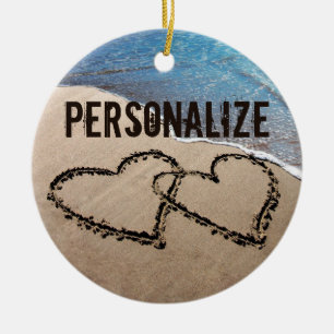 Dois Corações No Ornamento Da Areia