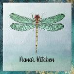 Dragonfly Verde Vintage Dourada em Blue Watercolor<br><div class="desc">Este design apresenta uma ilustração de libélula verde, ferrugem e dourada contra um fundo de cor azul-esverdeada macia. O padrão verde e preto nas asas da libélula é luminoso e distintivo. Seu nome ou outra mensagem que você quer, como "Nana's Kitchen" ou "Be Kind", aparece abaixo em uma fonte preta....</div>