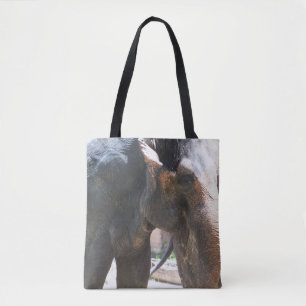Duas fotos diferentes de Elefantes na bolsa tote