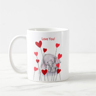 Elefante bonito com a caneca vermelha dos corações