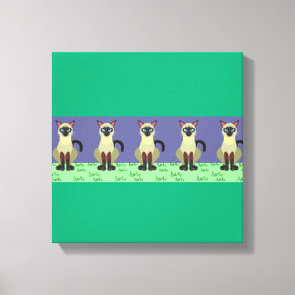 Elegant Siamese Cats in the Grass Canvas Print