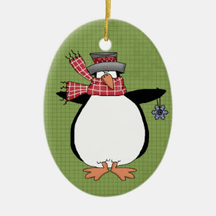 Enfeites de natal cerâmicos do pinguim do inverno