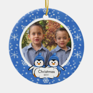 Enfeites de natal gêmeos da foto dos pinguins