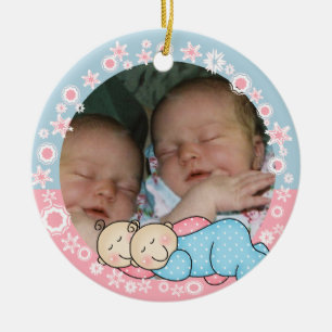 Enfeites de natal gêmeos do menino e da menina ø