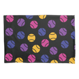 Esferas de tênis roxas e amarelas sobre fundo pret