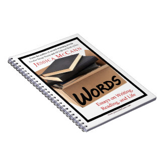 Espiral caderno com o livro de Jessica McCann como capa