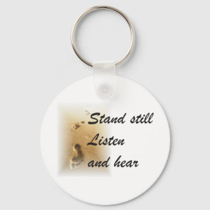 Esteja ainda e escute chaveiro