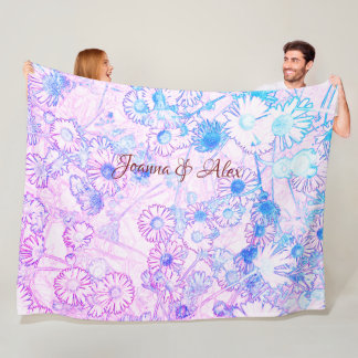 Estrelas no cobertor de velo rosa e azul