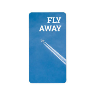 Etiqueta Avião voa no céu azul