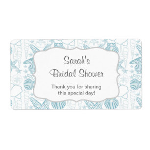 Etiqueta azul da garrafa de água dos escudos do