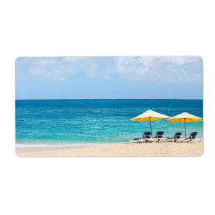 Etiqueta Cadeiras de Lounge na praia oceânica