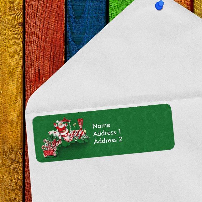 Etiqueta Comboio de Natal de Pepperminta papais noeis (Santa Claus on train with candy wheels and candy canes on green return address labels.)
