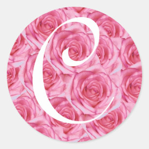 Etiqueta cor-de-rosa dos rosas da letra C do
