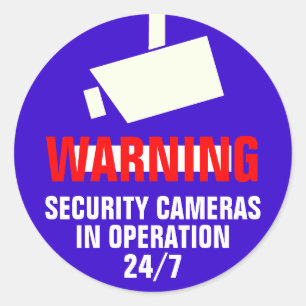 Etiqueta de advertência redonda da câmara de