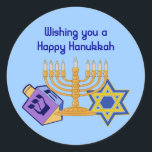 Etiqueta feliz de Hanukkah<br><div class="desc">" Desejando lhe um Hanukkah feliz". Etiquetas com um dreidle,  um menorah & uma estrela de David em cores brilhantes.</div>