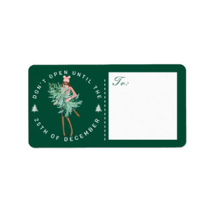 Etiqueta Não abra até a garota de Natal segurando árvore