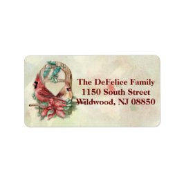 Etiqueta Par dos Cardinais de inverno com Poinsettia