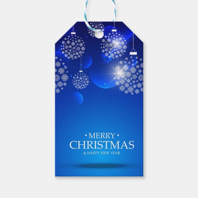 Etiqueta Para Presente Bolas brancas (A Christmas tag with a blue background and white snowflakes. )