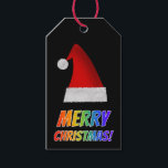Etiqueta Para Presente "MERRY CHRISTMAS!" em texto arco-íris, Red Santa H<br><div class="desc">Este divertido design de etiqueta de presente de Natal apresenta a mensagem "MERRY CHRISTMAS!" com letras com um padrão colorido de gradação do espectro do arco-íris. Ele também apresenta uma representação de Papais noeis vermelhos.</div>