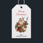 Etiqueta Para Presente Vintage Santa Claus e Reindeer Christmas<br><div class="desc">As etiquetas de presentes de Natal com uma ilustração de Natal divertida. Papai Noel em seu terno vermelho tradicional cavalgando uma rena grande e picada decorada com o Holly. Uma árvore de Natal nas costas.</div>