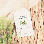Etiqueta Para Presente Winter Holly & Pine Christmas - Nome da família<br><div class="desc">Uma etiqueta de presente de Natal personalizada com uma saudação personalizada e seu nome de família. A frente destas etiquetas apresenta "Feliz Natal" ou a saudação de sua escolha na tipografia serif clássica. Abaixo, há um arranjo pintado à mão de folhagem de inverno e bagas vermelhas. Abaixo, seu nome de...</div>