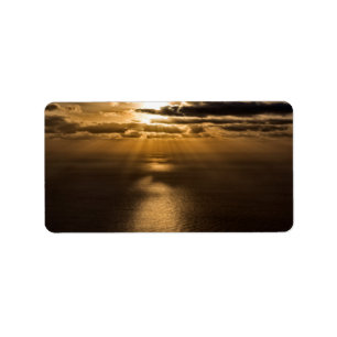 Etiqueta Sol acima do oceano Atlântico