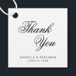 Etiquetas Para Lembrancinhas Obrigado Elegante Casamento de Caligrafia Branca N<br><div class="desc">A tipografia elegante favorece etiquetas com uma simples design com a mensagem "Obrigado" em caligrafia negra e seus nomes e data abaixo, sobre um fundo branco. As fontes e as cores de fundo podem ser alteradas para qualquer cor desejada. Estas etiquetas de rico e classe são excelente para um casamento...</div>