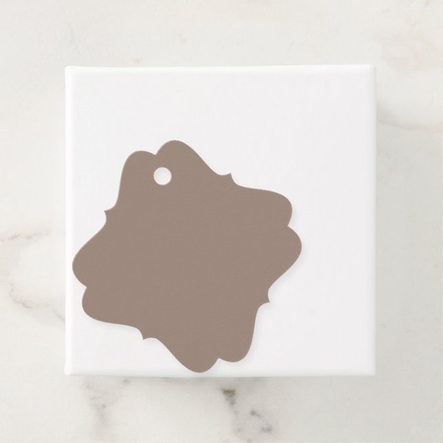 Etiquetas Para Lembrancinhas uma parede castanha com uma (In Situ)