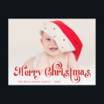 Feliz Natal com letra estilosa em cartão postal de<br><div class="desc">Um design vermelho festivo com foto de bebê fofo e letras vermelhas sobrepostas. O texto e a mensagem podem ser personalizados.</div>
