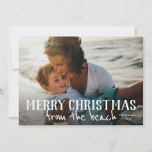 Feliz Natal da foto na praia cartão de férias