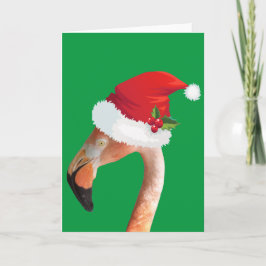Festividades Flamingo rosa em um cartão de Natal com chapéu ver