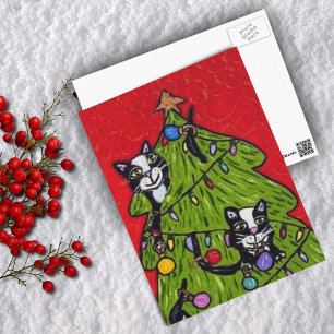 Festividades Gatos no cartão postal da árvore de Natal