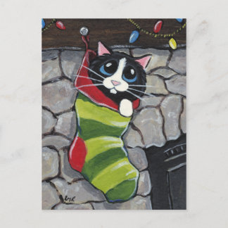 Festividades Tuxedo Cat em um cartão postal de natal