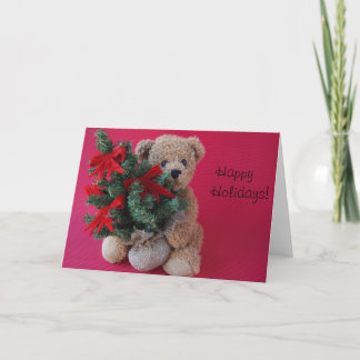 Festividades ursinho de peluche com cartão de saudação da árvor