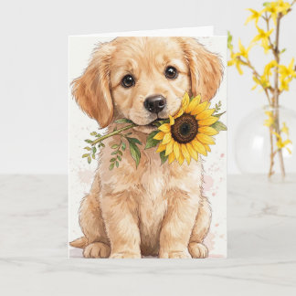 Filhote de golden retriever segurando um cartão de