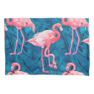 Flamingos em folhas de bananas azuis