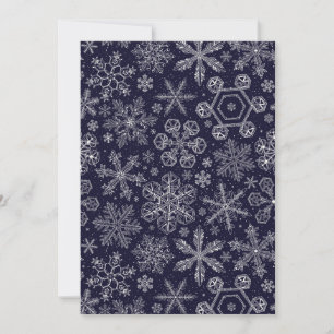 Flocos de neve brancos em azul