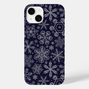 Flocos de neve brancos em azul